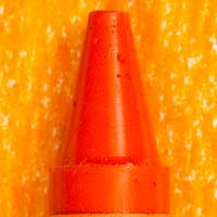 Yellow-orange crayon on paper swatch